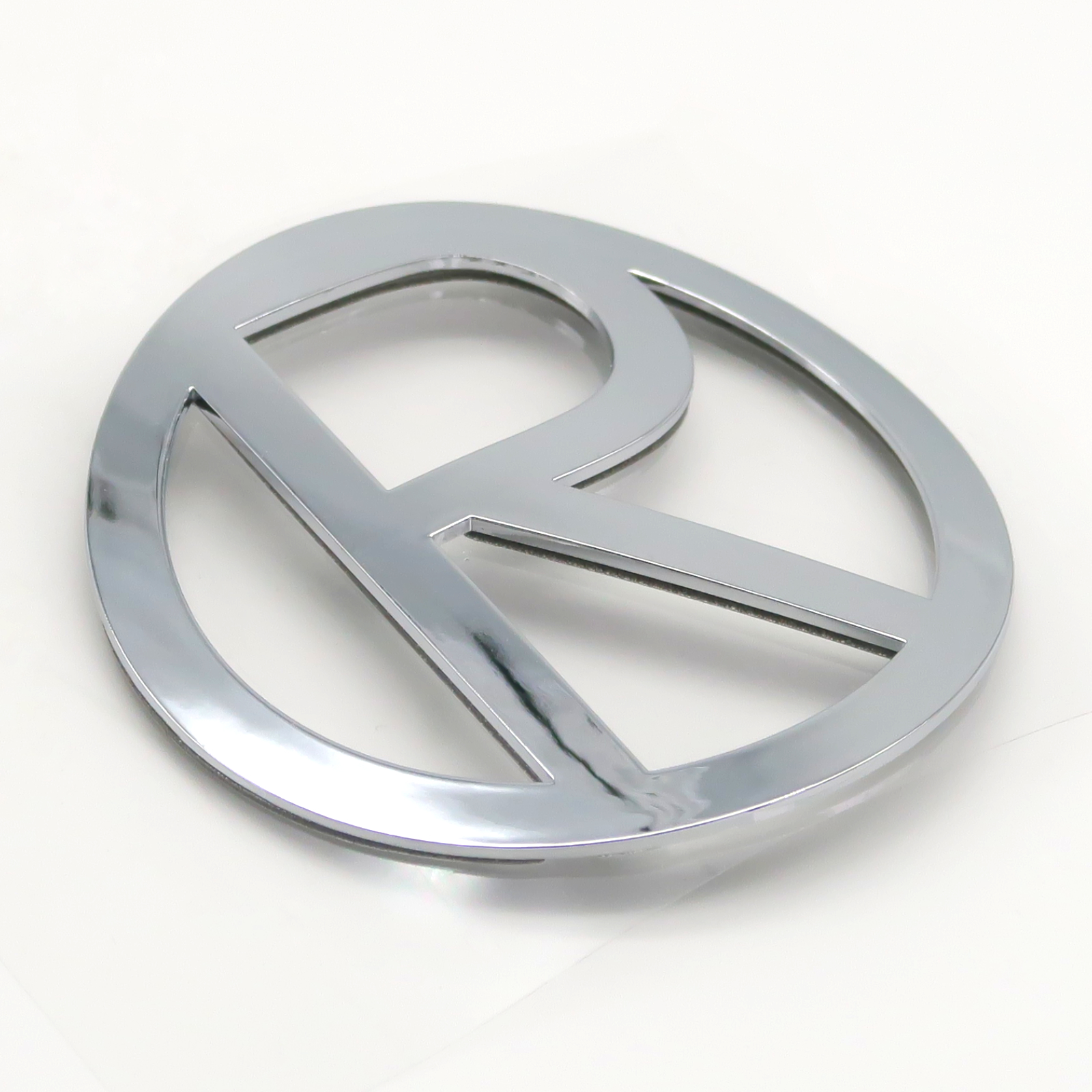 Trike15/25V2Pm/V3Pm/Quad15/25V2Pm/V3Pm/R31 - Aufkleber, Rolektro Logo, R, rund, 80mm, Metalloptik, vorne